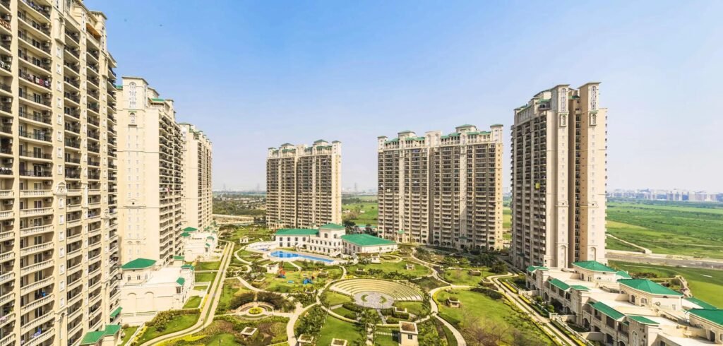 High-rise residential apartment towers surrounded by landscaped gardens and a central courtyard